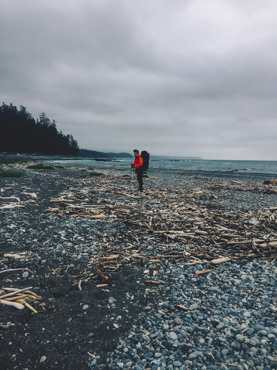 person standing near body of water