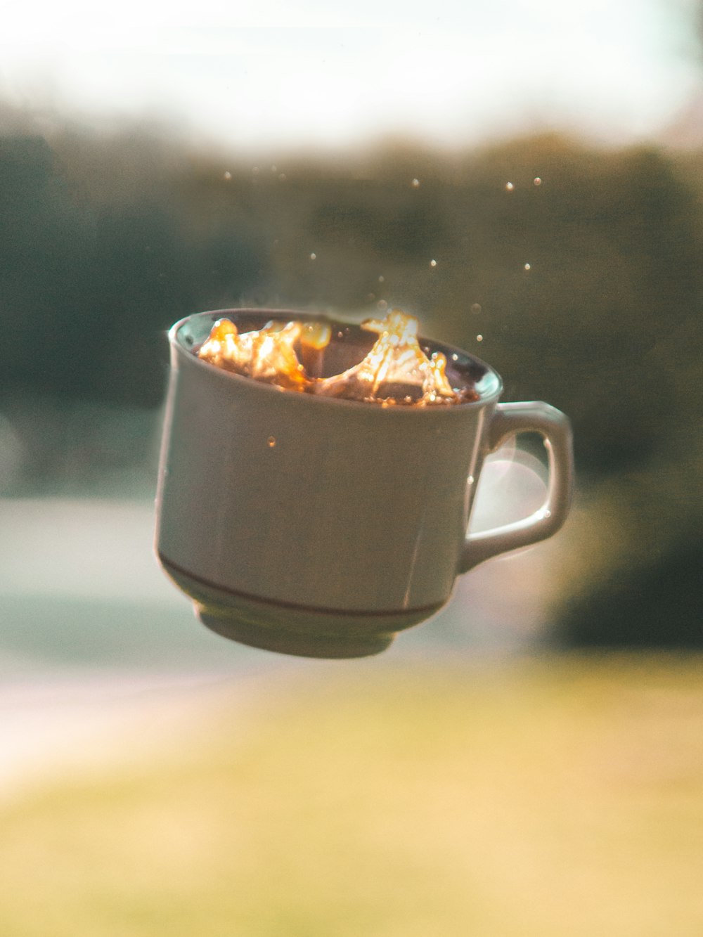 selective focus photography of cup