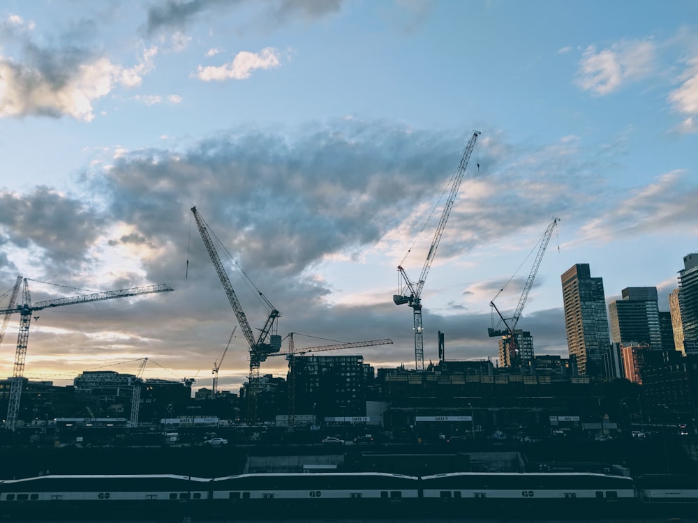 city with wrecking ball during daytime