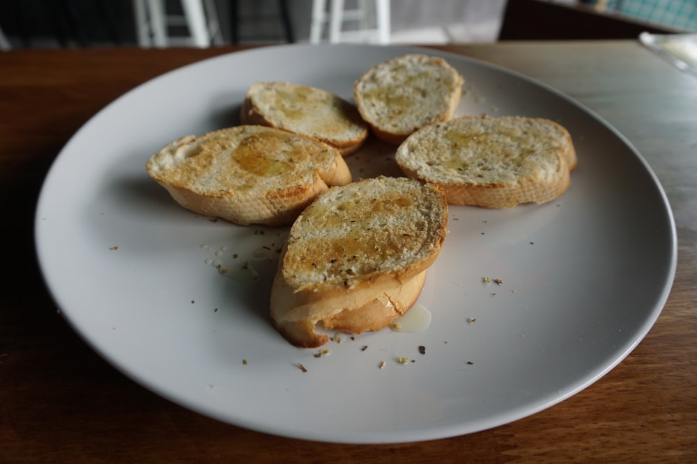 slices of toasted bread on white plate