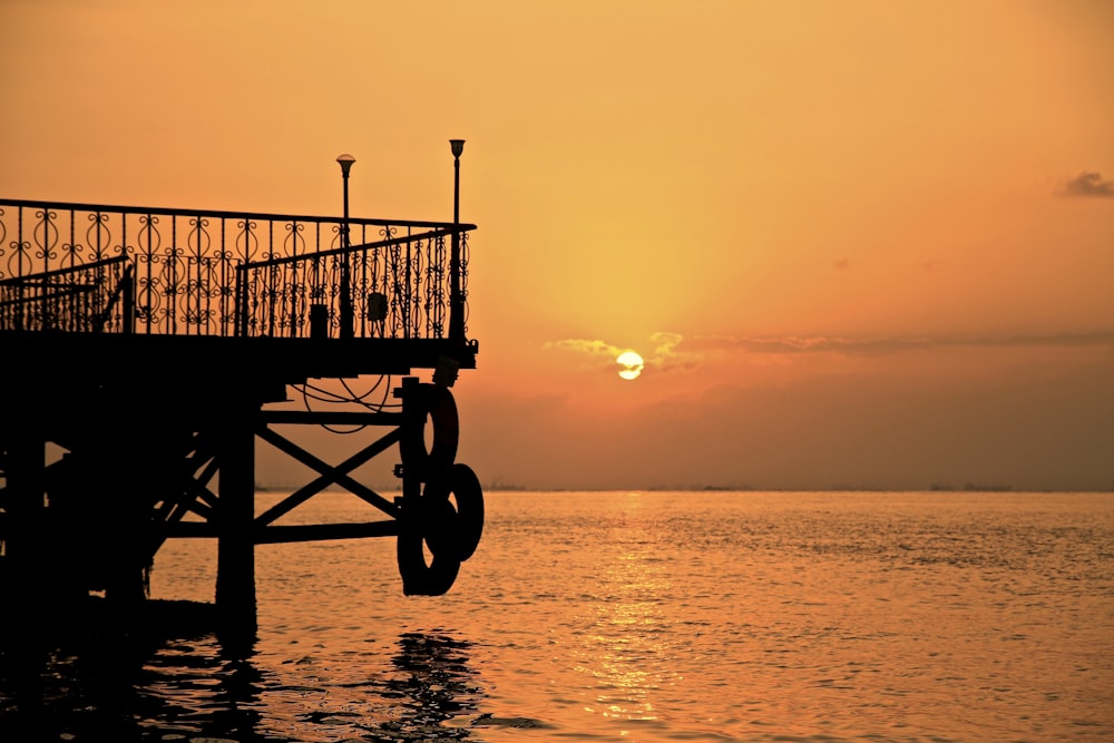 dock with handrail during golden hour