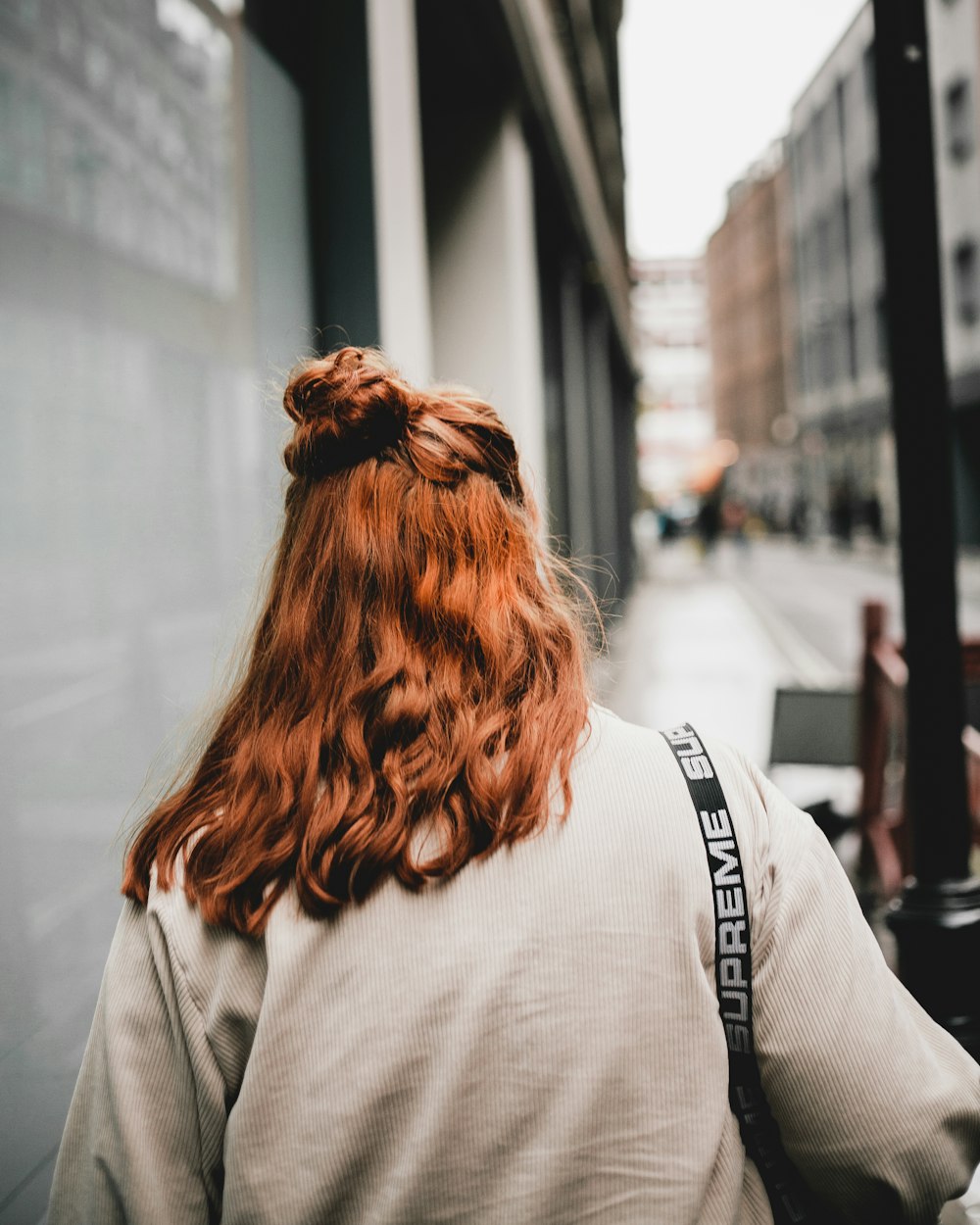 woman in beige jacket