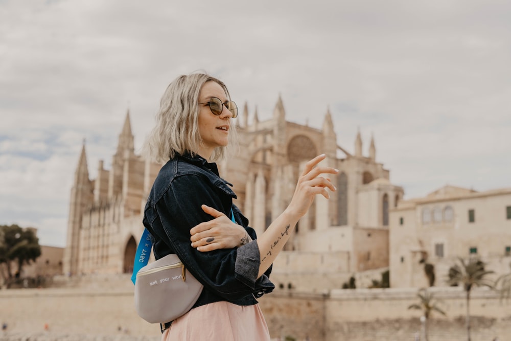 woman wearing jacket and sunglasses