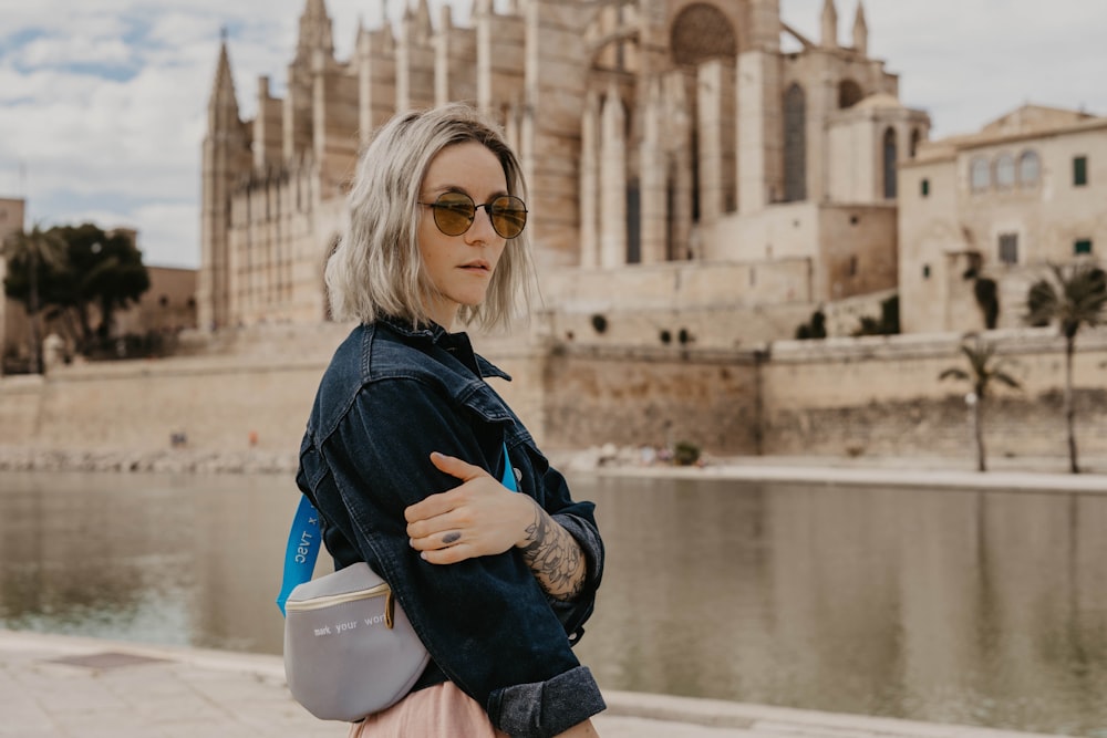 woman wearing blue denim jacket