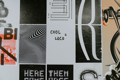 a close up of a wall with many different designs on it