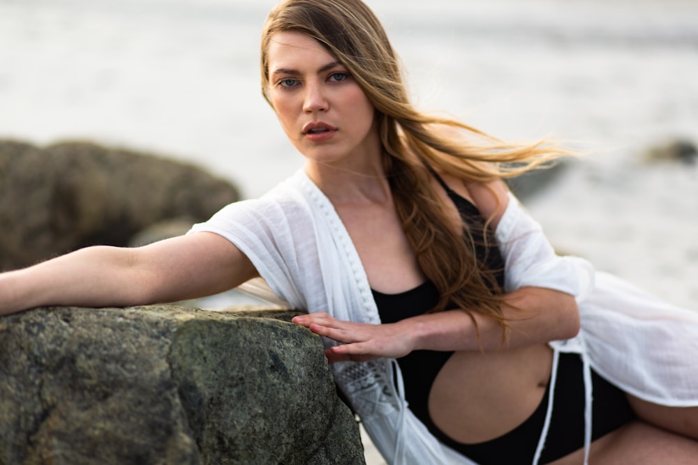 woman wearing black monokini near ocean during daytime