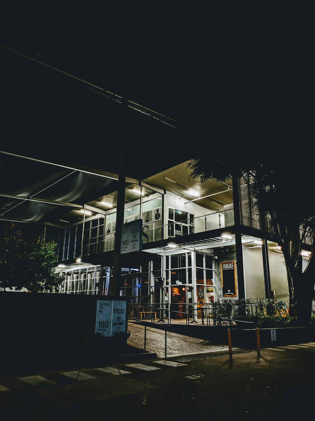 white and black concrete building at night time