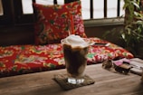 shake on table beside sunglasses