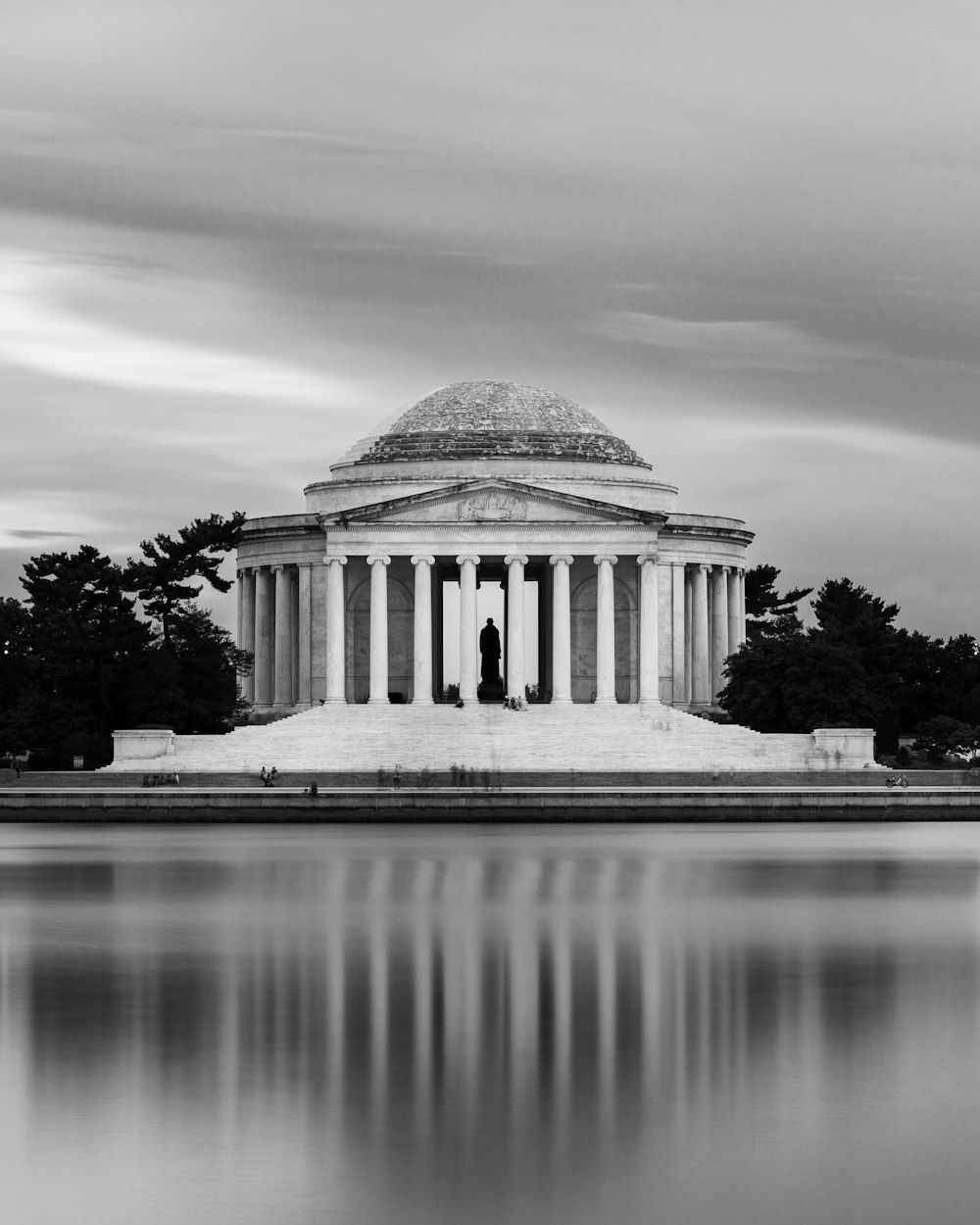 grey cloudy sky over Washington landmark