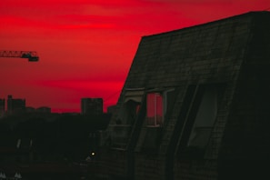 A wide shot of a restored commercial building roof at sunset