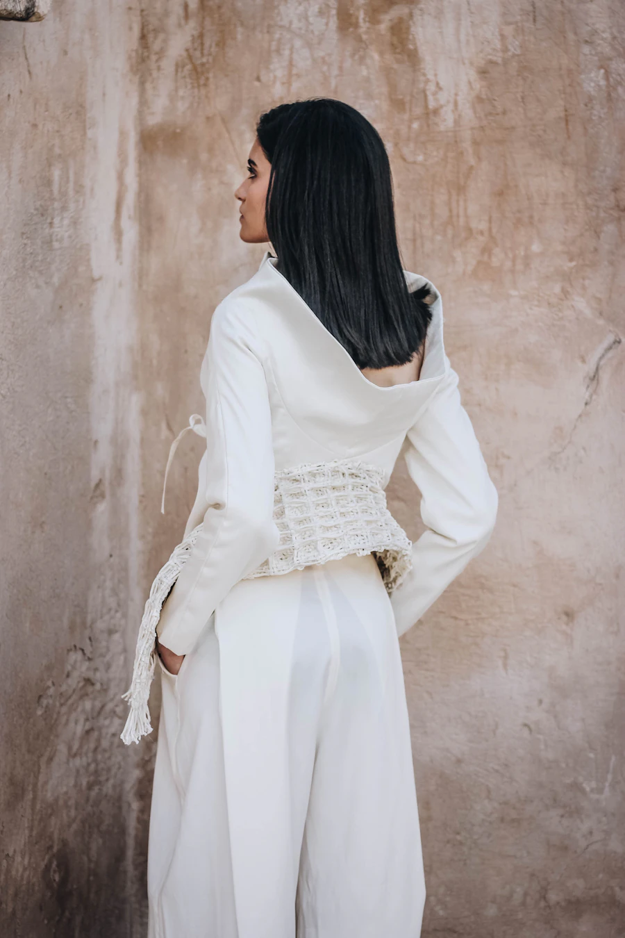 White blouse detail photographed against a warm neutral wall for an editable eBay draft mock