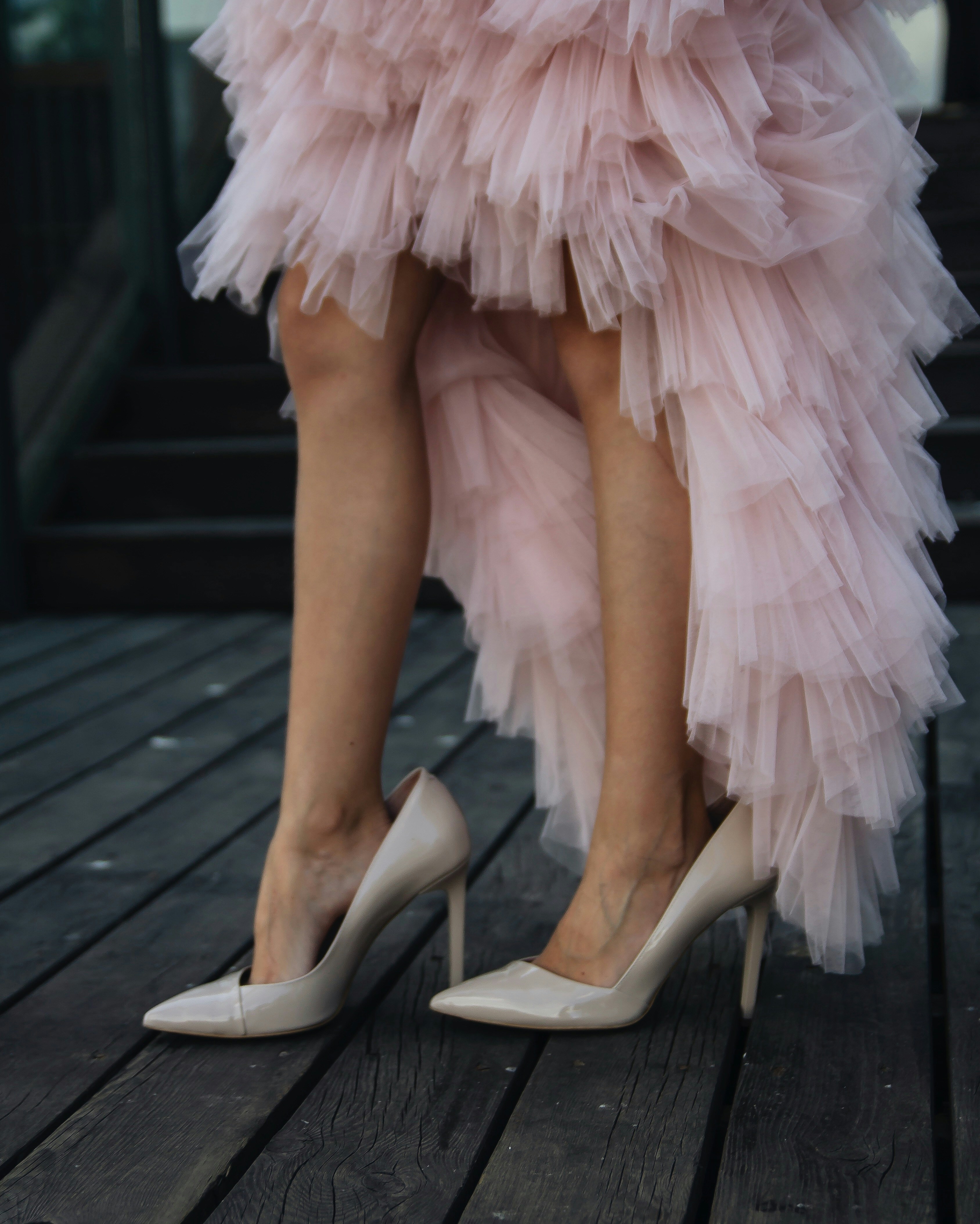 woman wearing pink tulle hem gown