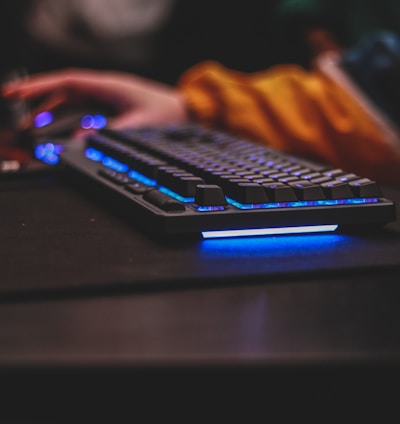selective focus photography of gaming keyboard