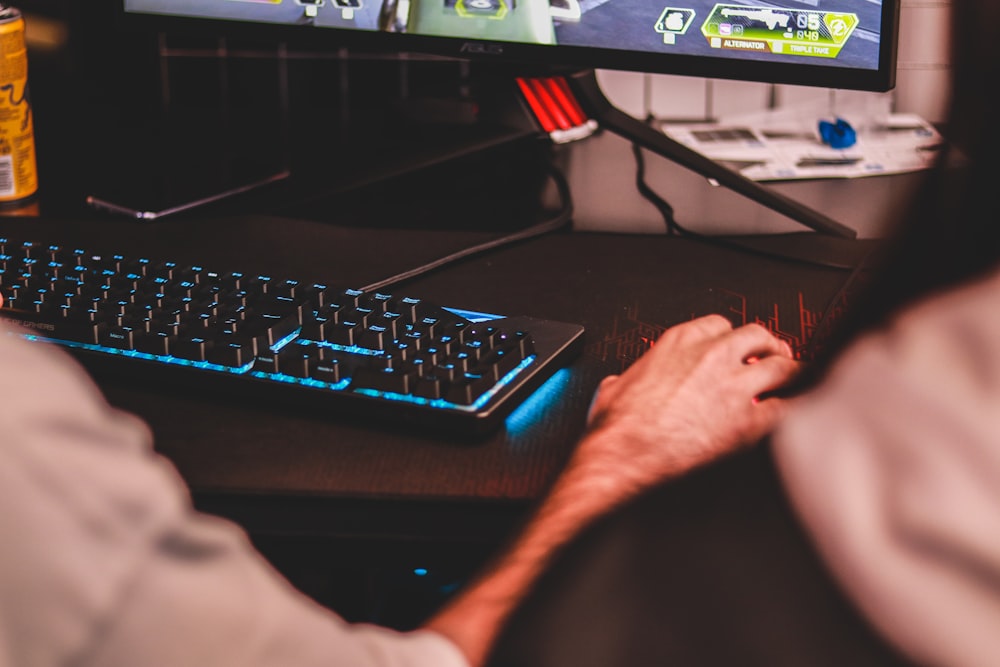 person holding computer mouse