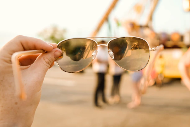 Bright outdoor shot of a man sporting sleek truvision sunglasses on a sunny day.