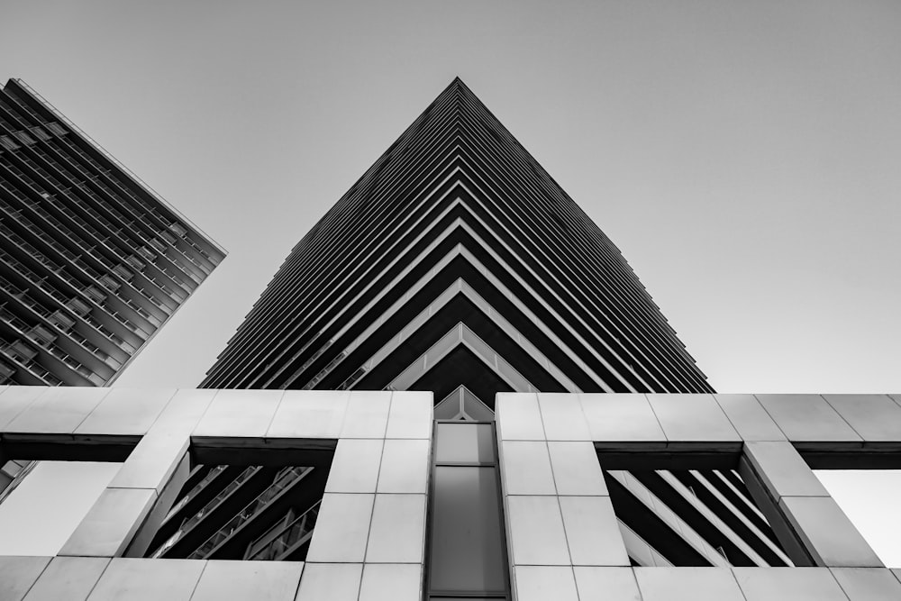 grayscale photography of high rise building