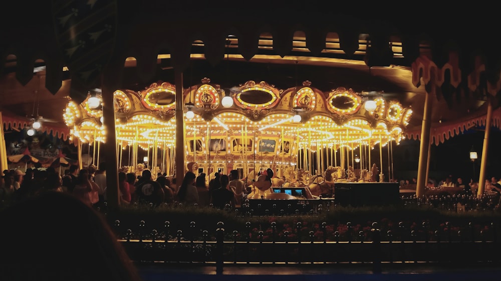 people riding Mary-Go-Round surrounded with people