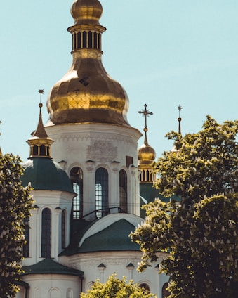 A serene view of Nikolski Hram's historic church building bathed in soft morning light.