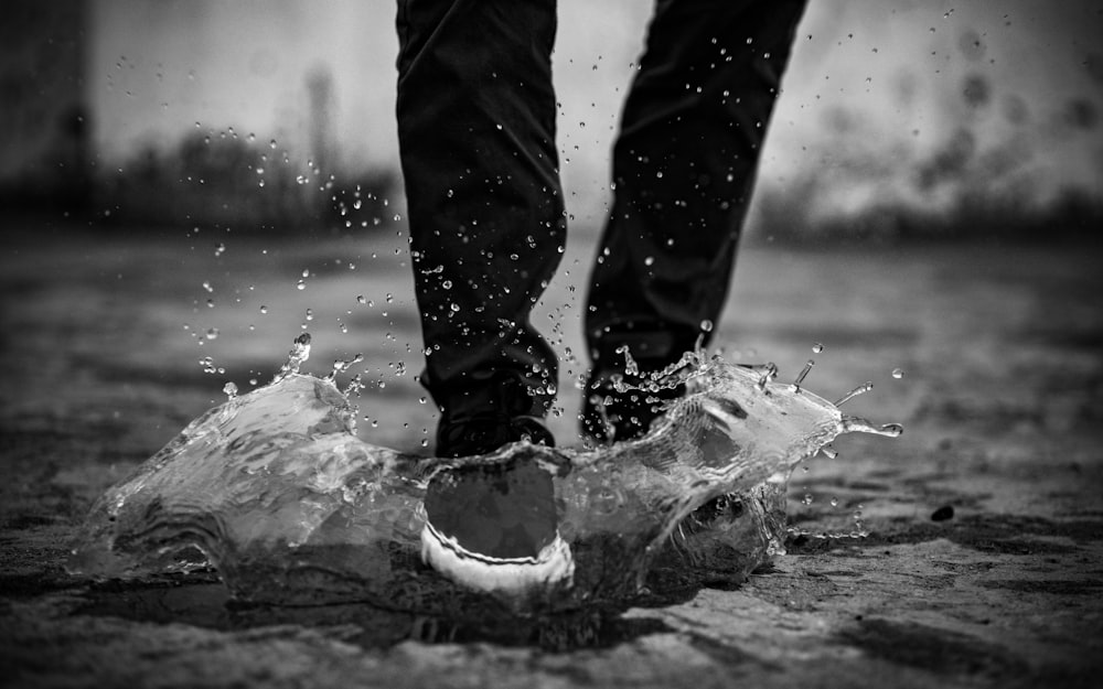 man stepping on water