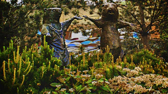 A playful sketch of a family of animals holding hands in a meadow