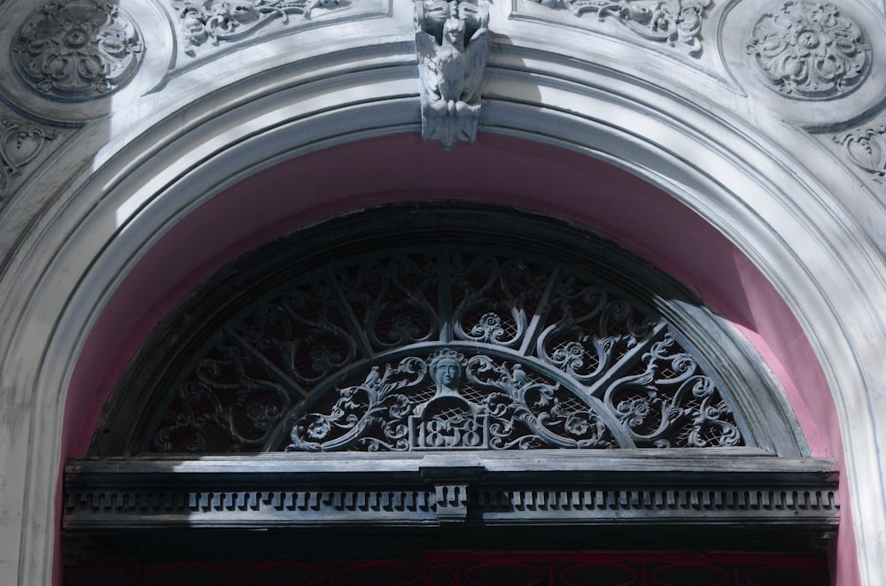 building with ornate black doorway arch