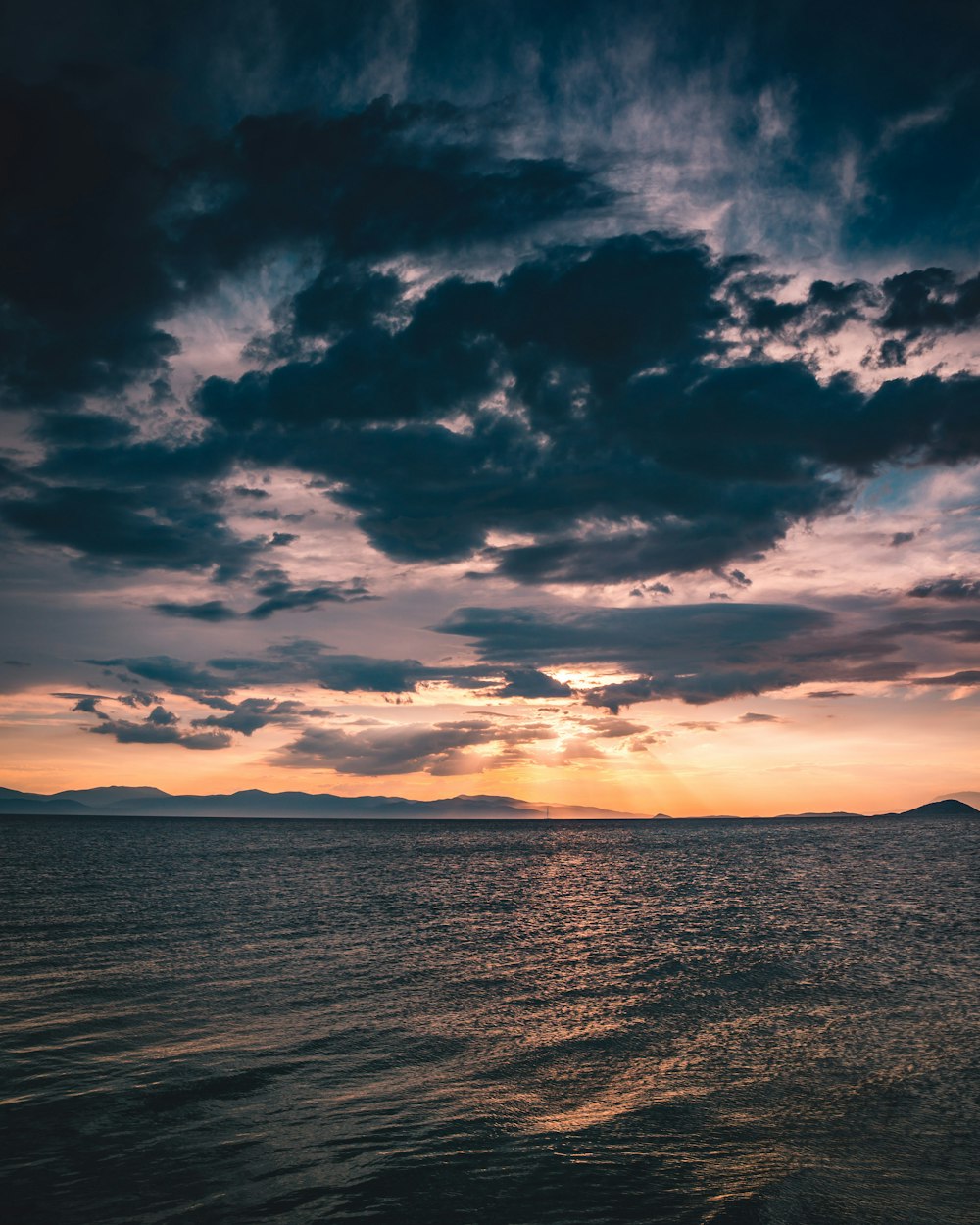 body of water during golden hour