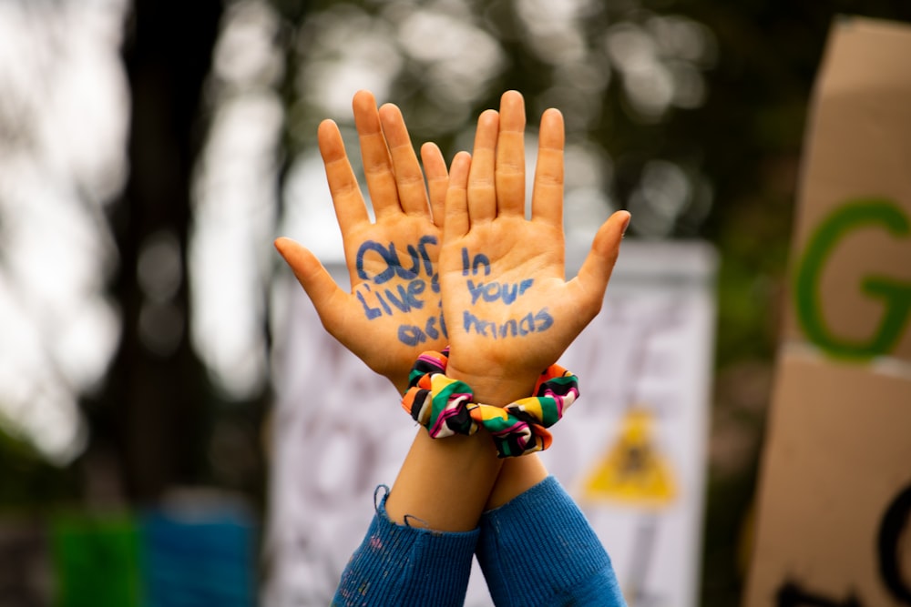 selective focus photography of hands