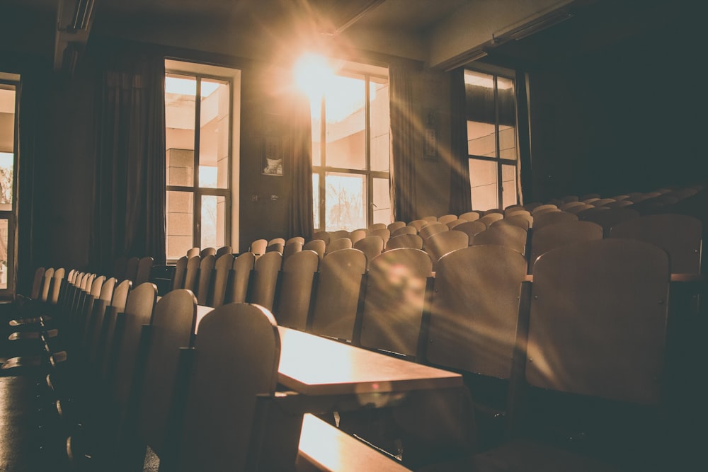 vacant chair in room during golden hour