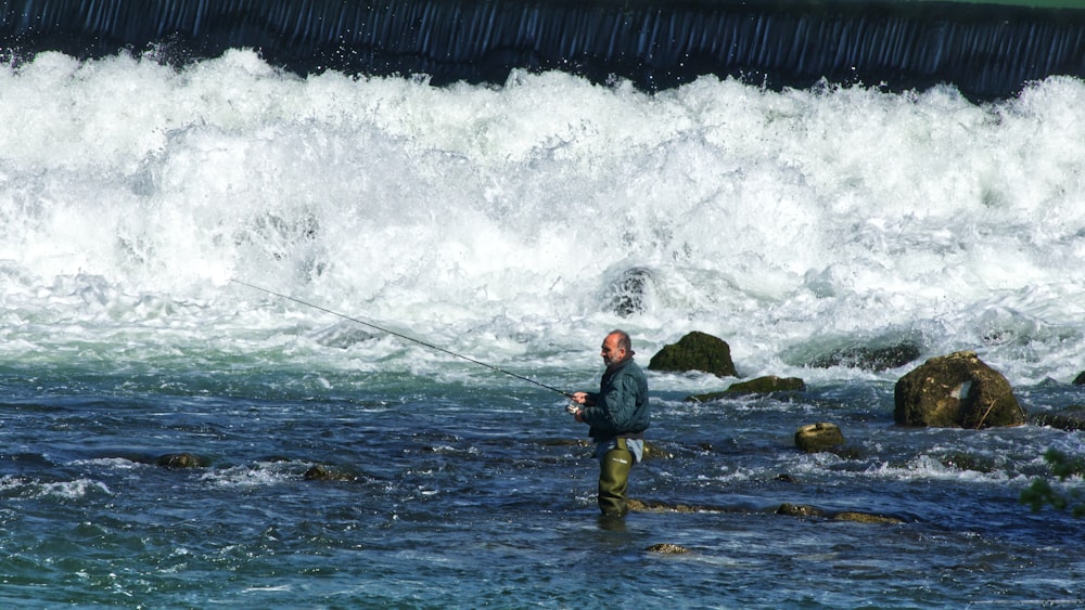 man standing on the seashore