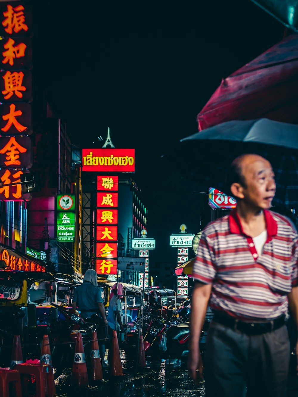 man on road at night