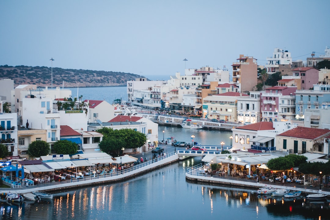 body of water and city during day