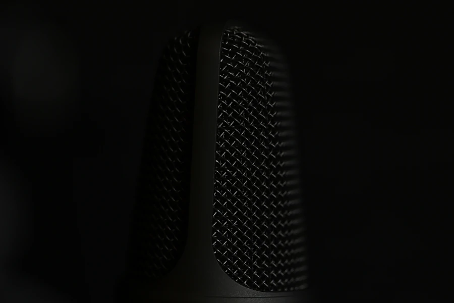 Close-up of a microphone in a dark event setting