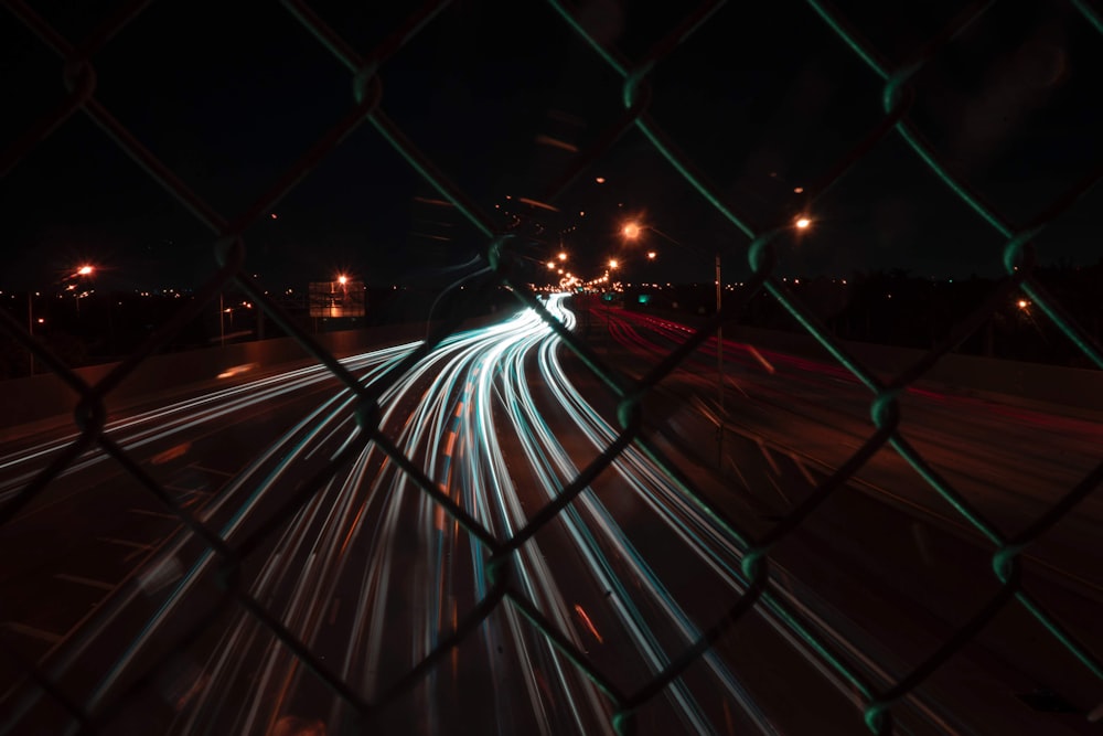 a blurry photo of a city street at night