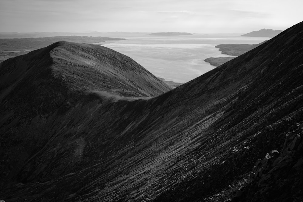 grayscale photography of mountain