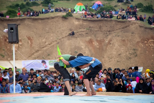 two men doing sports in canvas in Semnan Province Iran