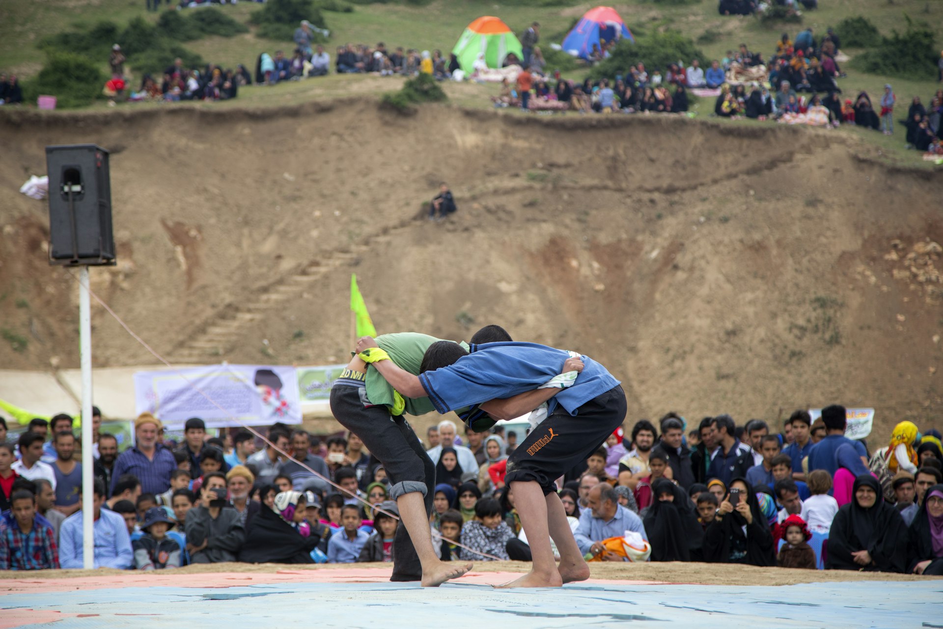 two men doing sports in canvas