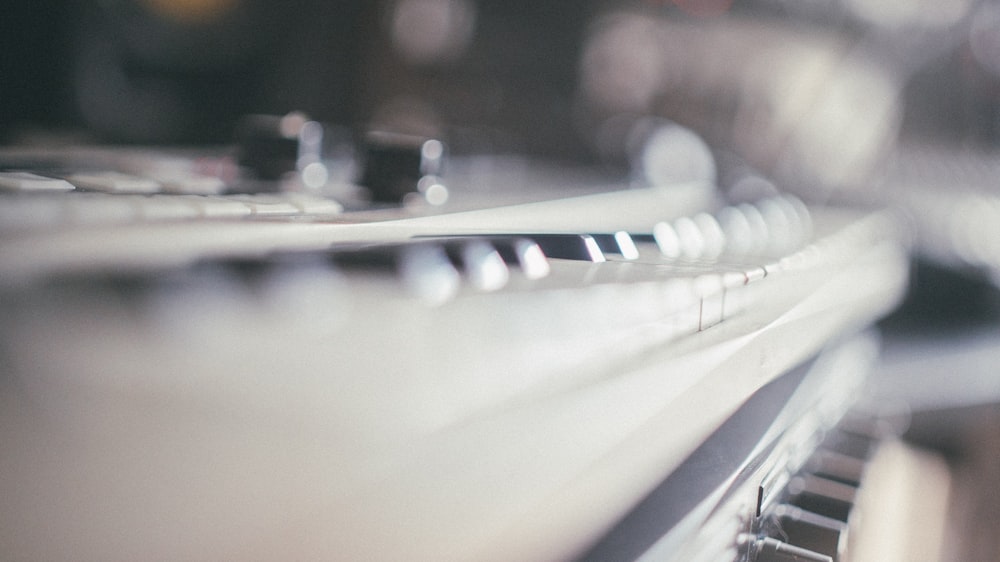 a close up of a keyboard with a blurry background