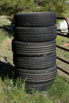 Stack of new tires ready for installation at Borracharia Felix Ltda