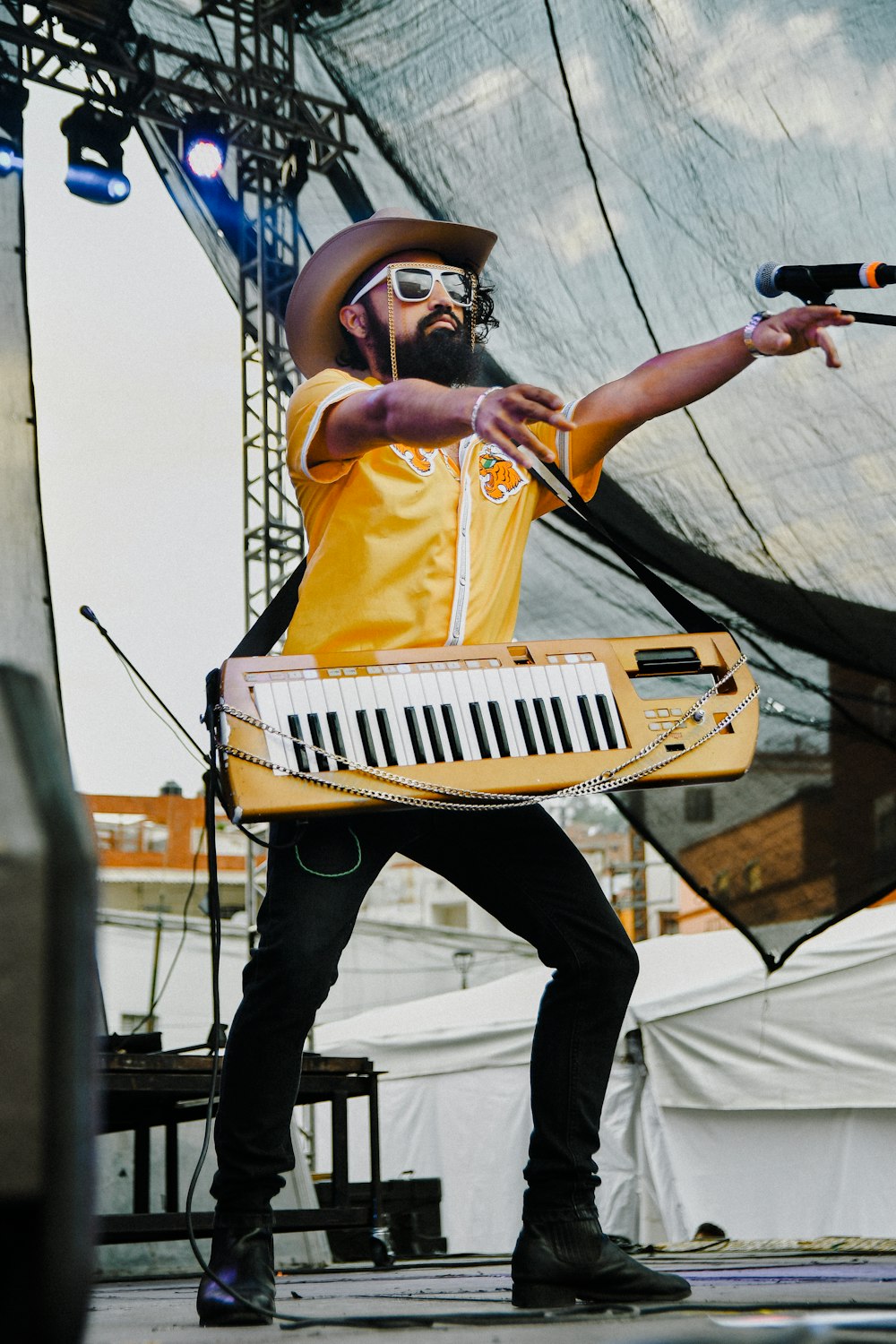 man carrying keyboard