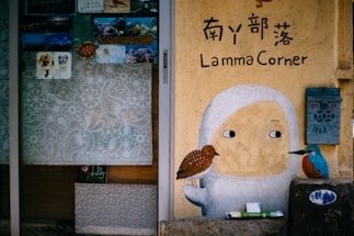 A colorful comic-style illustration of a friendly character holding a giant pencil next to a mailbox overflowing with letters.