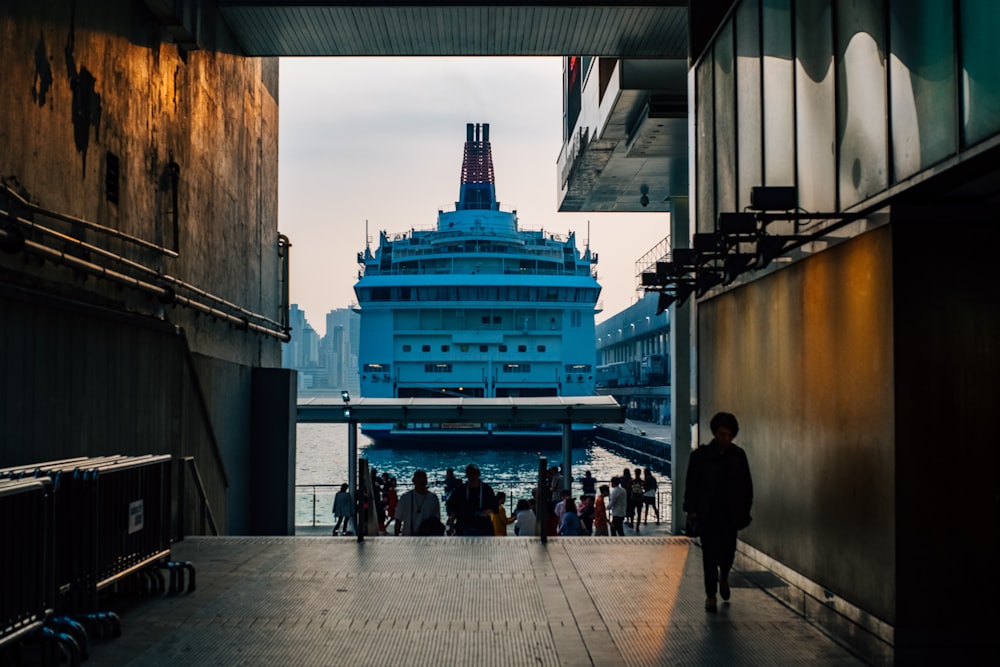 people near blue building