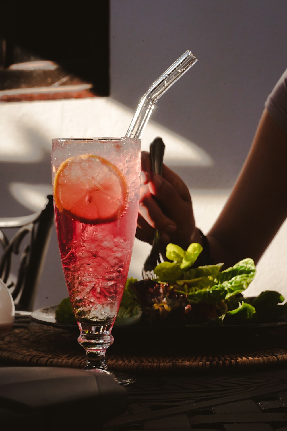 clear drinking glass filled by juice