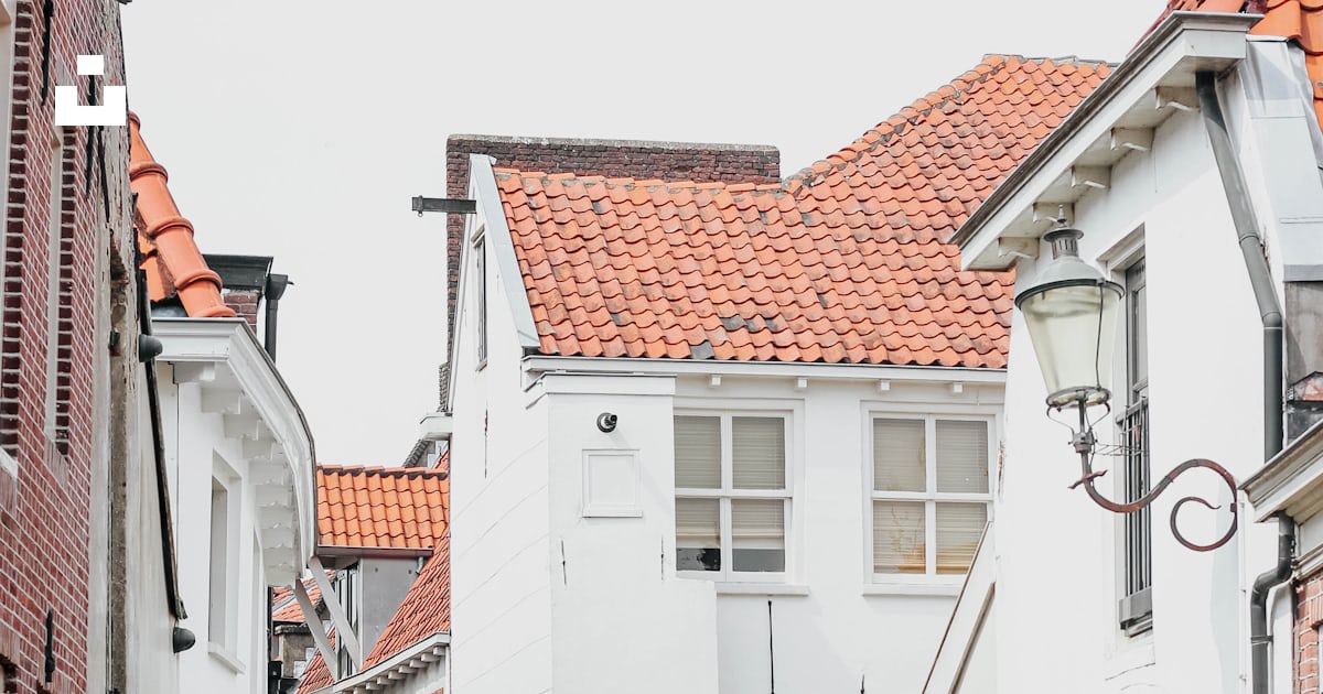 Empty road between white concrete houses photo – Free Amersfoort Image ...