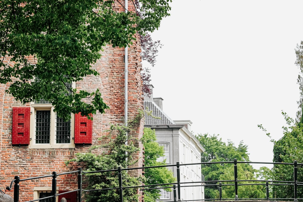 brick house near trees