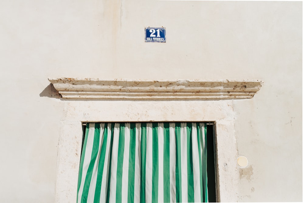 green and white-striped curtain