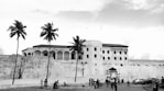 people near concrete building