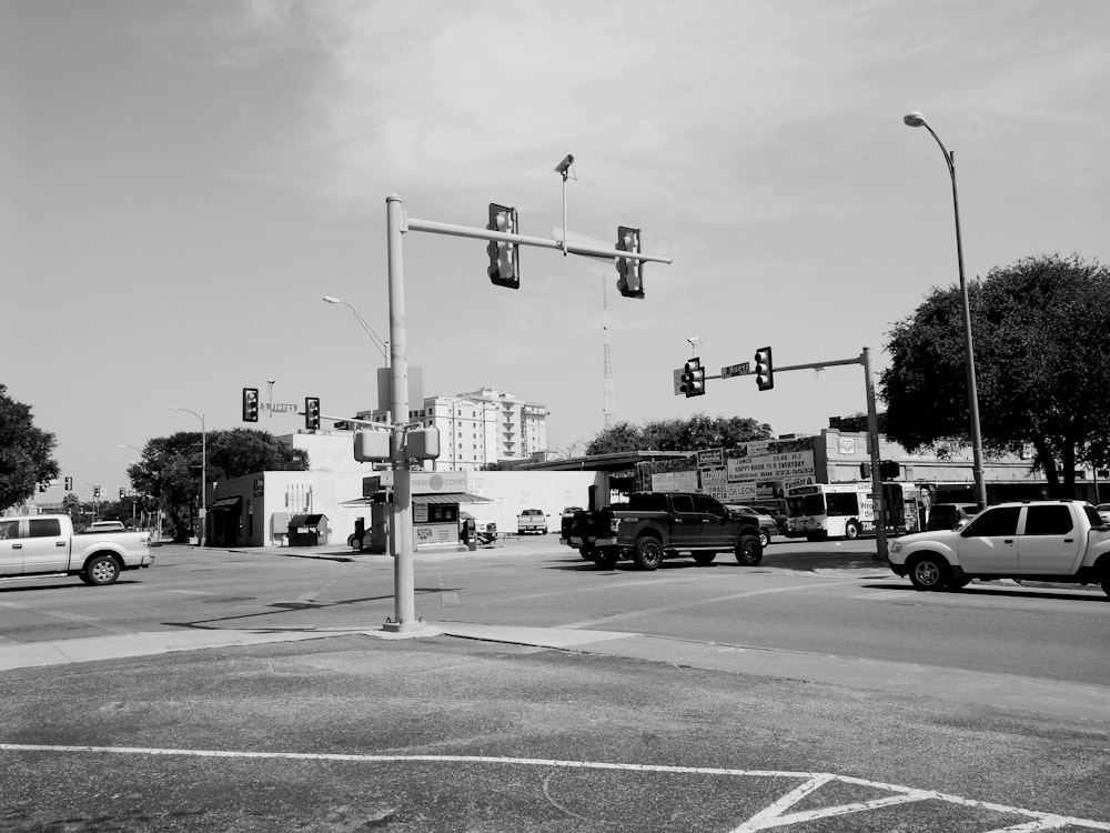 different vehicles on road beside high-rise buildings