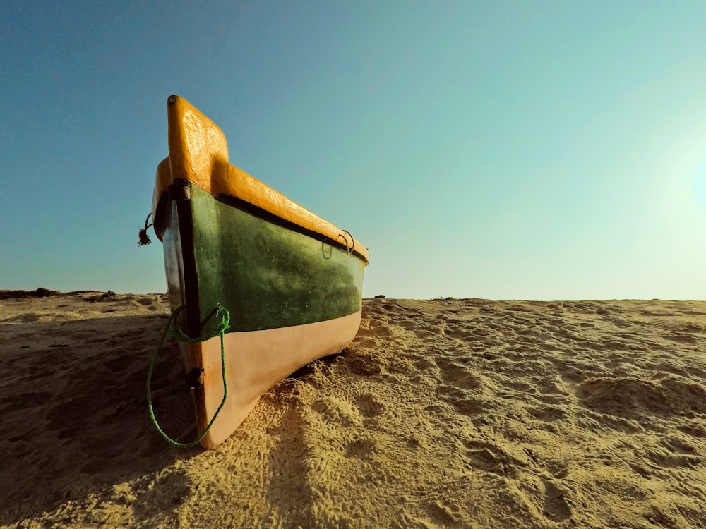 green and brown boat