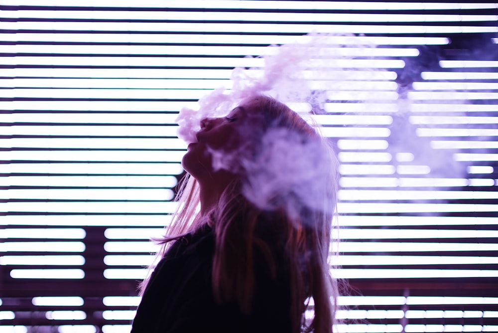 woman surrounded with smoke