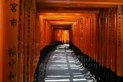 empty tunnel between red walls